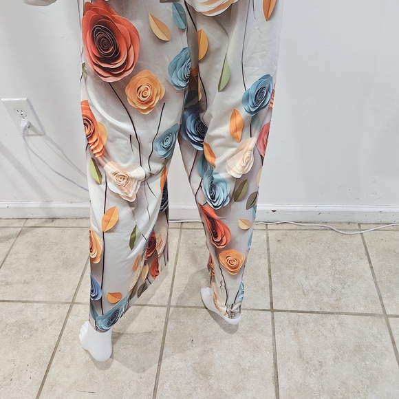 Elegant Floral Sleeveless Jumpsuit - Picture 4 of 9